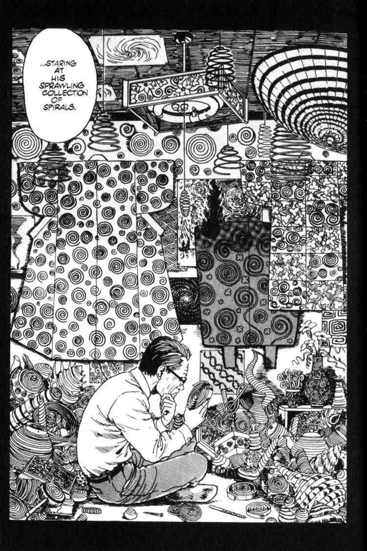 Shuichi’s father sits among walls and shelves crowded with spiral-patterned objects.